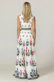 Γυναικείο φόρεμα με κεντήματα και ζώνη λευκό-εμπριμέ Miss June